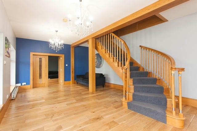 The beautiful sweeping staircase.