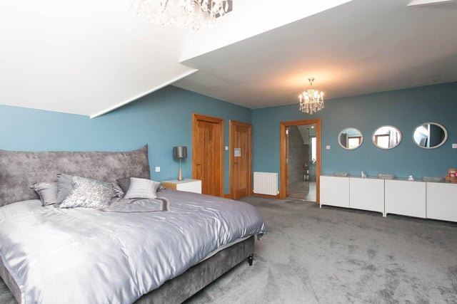 The master bedroom with stunning views of Slieve Gallion, dressing room and access to main bathroom.