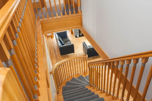 The beautiful sweeping oak staircase is a feature in itself.