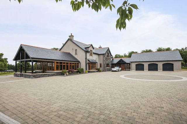 This exceptional five-bedroom detached country residence of approx 6500 sq ft has a swimming pool, cinema room, gym and triple garage.