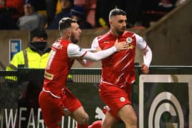 Joe Gormley celebrates his equaliser for Cliftonville