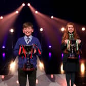 The three winners of the BBC Northern Ireland School Soloist Of The Year 2022 recorded in the BBC’s Blackstaff studios in Belfast. They are, from left, Eva Rowan (St Patrick’s Grammar, Downpatrick) winner of the Senior final; Tom Johnston (Macosquin Primary School), winner of the Primary final; and Sophie Lennon (Sacred Heart Grammar School, Newry), winner of the Junior final