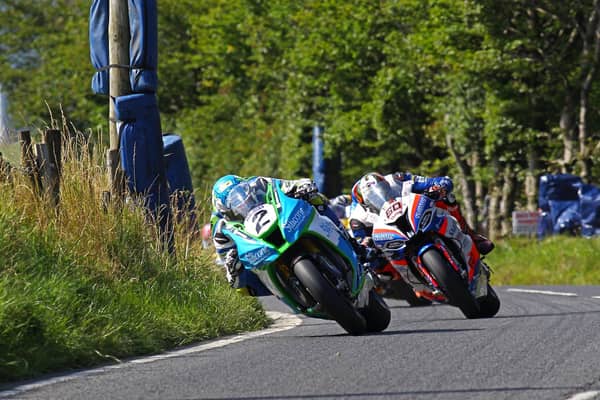 Dean Harrison (Silicone Engineering Kawasaki) leads Peter Hickman (Smiths BMW) at the Ulster Grand Prix in 2019.