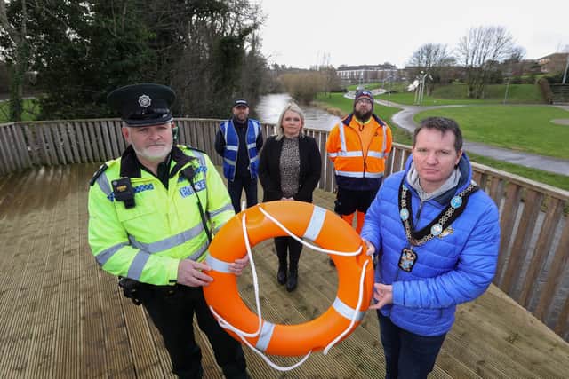 Armagh, Banbridge and Craigavon Council Lord Mayor  Glenn Barr with PSNI Inspector Alwyn Peters with a life ring. They issued a warning over the potentially fatal consequences of misusing life-saving rings at waterways in the Upper Bann area.