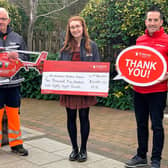 Pictured are Damien McAnespie Fundraising Manager for AANI alongside Caoimhe Conway and Anthony Kelly from AG. The picture was taken at the 2020 presentation.