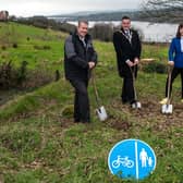 Minister Edwin Poots, Mayor Alderman Graham Warke and Minister Nichola Mallon at the site for the Strathfoyle Greenway.