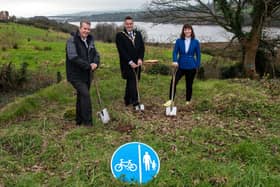 Minister Edwin Poots, Mayor Alderman Graham Warke and Minister Nichola Mallon at the site for the Strathfoyle Greenway.