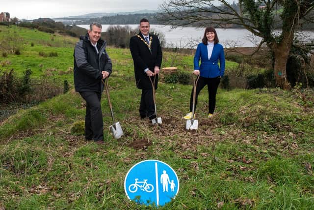 Minister Edwin Poots, Mayor Alderman Graham Warke and Minister Nichola Mallon at the site for the Strathfoyle Greenway.