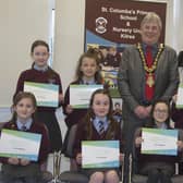 The Mayor of Causeway Coast and Glens Borough Council Councillor Richard Holmes pictured with Primary 6 pupils from St Columba’s Primary School in Kilrea who took part in the Energy Innovation Challenge during Northern Ireland Apprenticeship Week