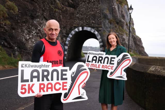Caroline Rowley, Head of Business Development at Kilwaughter Minerals, with a member of Larne Athletic Club ahead of the races.