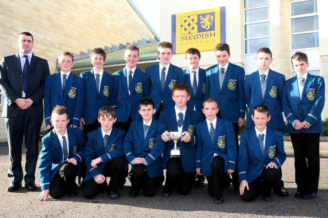 The Slemish College Year 9 rugby team, winners of the Coleraine Under 13 High Schools mini tournament. Included is Neil Luke (coach). BT41-207AC