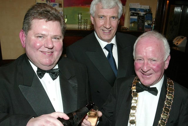 Harry Quinn Chairman of Cookstown Vintners Association pictured with Jackie Prentice and Raymond Mc Dyer of the Galgorm Group.