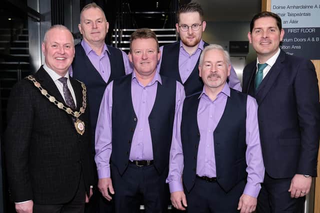 The Band of Gold with Malachi Cush and Council Chair Cllr Paul McLean.