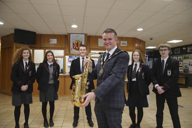 Mayor of Lisburn & Castlereagh City Council, Alderman Stephen Martin with members of Wallace High School that will be taking part in the Mayor's St Patrick's Concert to raise money for ADD-NI and MACSNI.
