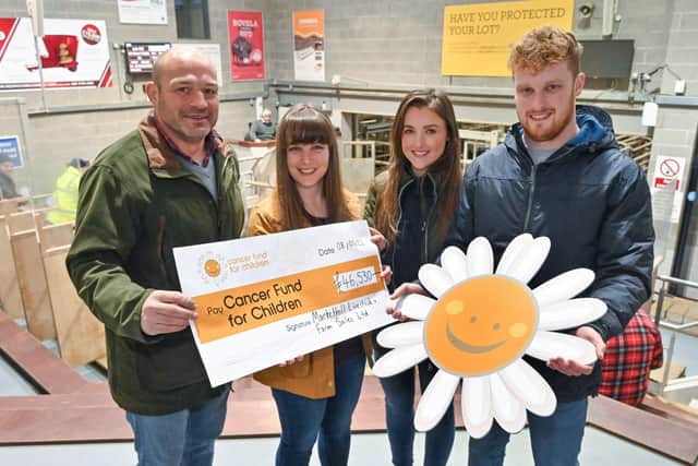 Cancer Fund for Children’s Ambassador, former Ulster and Ireland Rugby captain Rory Best is presented with a cheque for £46,530 by Louise Hill, Amy Muldrew and Jamie Hewitt from Markethill Livestock Sales.  The funds were raised through a Christmas Charity Show and Sale which was held in memory of one-year-old Theo Hill who passed away in October 2021.