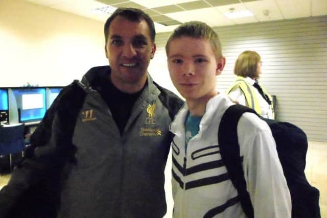 Matthew Crawford from Portadown who met former Liverpool FC manager Brendan Rodgers while on a trip to a match.