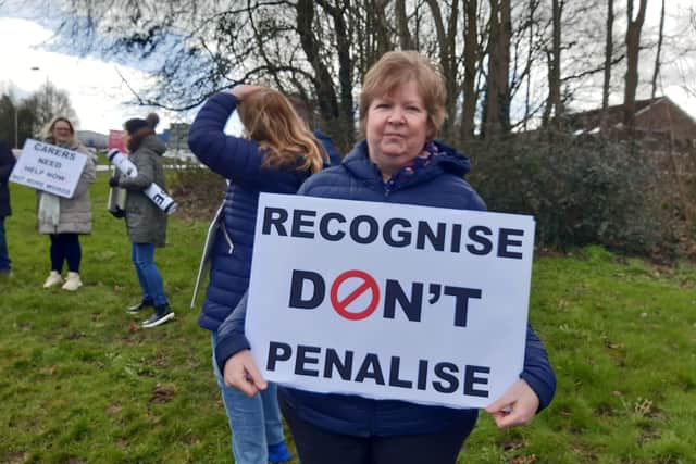 Tracey Gilliland at the protest by carers of adults with Learning Disabilities close to Craigavon Area Hospital. The carers are asking the Southern Health Trust to reinstate their pre-pandemic facilities including day care and respite care.