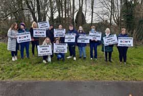 Carers of adults with learning disabilities stage a protest at the Southern Health Trust Headquarters near Craigavon Hospital on Monday.