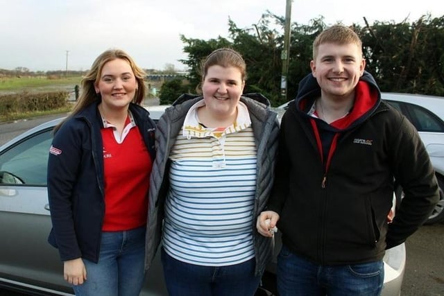 From left: club members Ellie McCauley, Rebecca and Will Cromie enjoying the big tractor run at Rathfriland
