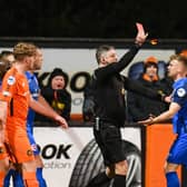 Referee Raymond Crangle issued two red cards to Larne in a 1-1 draw at Carrick Rangers. Pic by Pacemaker
