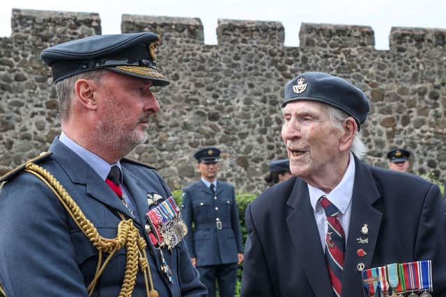Air Marshal Reynolds chatting with 97-year-old Lancaster Bomber Rear Gunner David Moffatt at a Battle of Britain act of remembrance in Carrickfergus.
