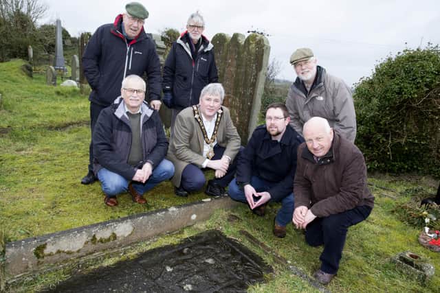 The Mayor of Causeway Coast and Glens Borough Council, Councillor Richard Holmes, pictured in Ballywillan cemetery outside Portrush at the burial place of Dorothea Ross, alleged daughter of James II, with members of the Portrush Heritage Group. Back row (left to right): John White, Jim Cavalleros, Canon John McKegney; and front row (left to right): Billy McNaul, Nic Wright (Council’s Museum’s Service Engagement Officer), and John McNally