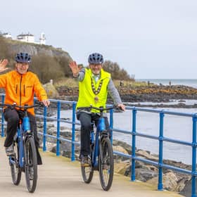 The Mayor of Mid and East Antrim, Councillor William McCaughey and Mark Logan, Pedals2Places tour guide, at the launch of a new e-bike tourism offering in Whitehead.