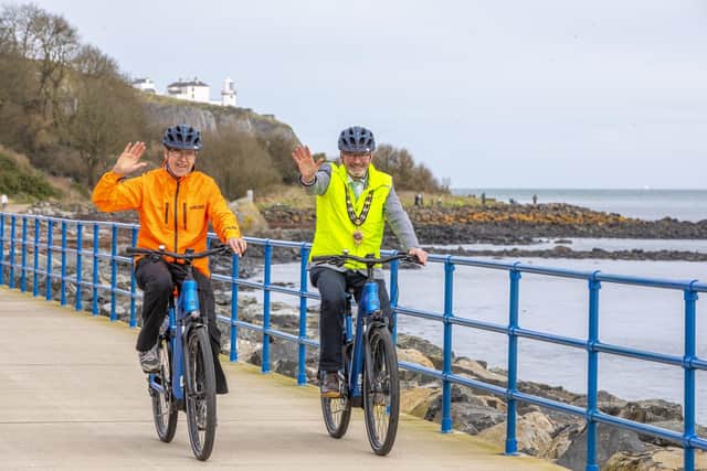 The Mayor of Mid and East Antrim, Councillor William McCaughey and Mark Logan, Pedals2Places tour guide, at the launch of a new e-bike tourism offering in Whitehead.