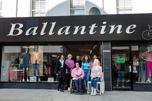 Tracy and her daughter Dara with ‘Flossy’, Gordon Kennedy and staff at Ballantine Fashions in Larne.