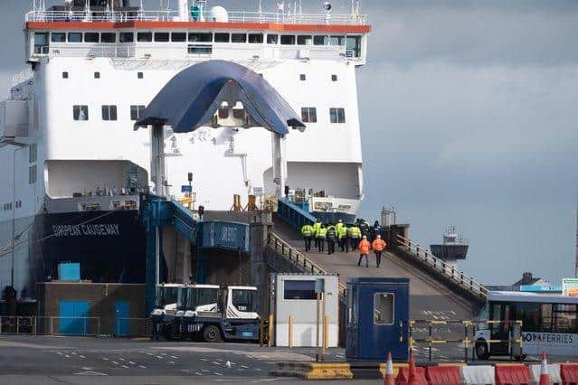 Security and severance teams board the P&O Causeway in Larne Harbour last Thursday. Photo: Pacemaker Press