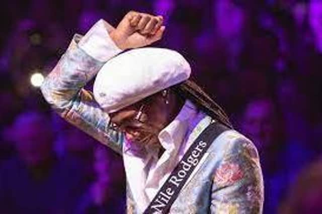 Nile Rodgers performing with Chic during the City of Culture year in 2013.