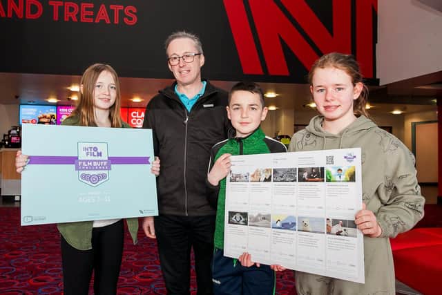 St John’s Primary School in Dungiven won the top prize of a trip to the cinema after talking part in Into Film’s first Film Buff Challenge. Pictured is teacher Gary Lynch, who runs the school’s film club with (from left): Sarah, Enda and Darcy