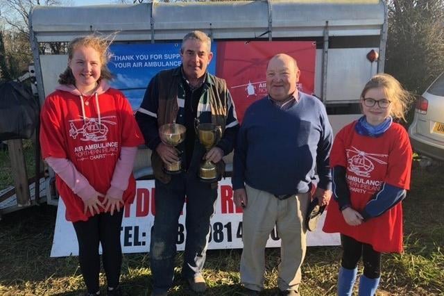 David Grattan from Banbridge was the vintage champion. Pictured with chairman Martin Gill and Caitlyn and Carys Gill