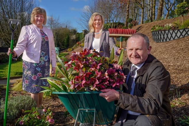 L-R Cllr Frances Burton (Vice President, NILGA) joins Helen Boyd (Tidy Randalstown) and Enda Sheridan (Translink) to celebrate the winners of the 2021 Ulster in Bloom awards, which saw Randalstown pick up a hat trick of titles