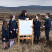 Infrastructure Minister Nichola Mallon visited the Garron Plateau in County Antrim to launch NI Water’s Schools Peatlands Poster competition. Pictured are Grace, Annie, Shauna and Peter from St Mary’s Queen of Peace PS, Glenravel with Anna Killen Outreach and Learning Officer, NI Water.Picture: Michael Cooper