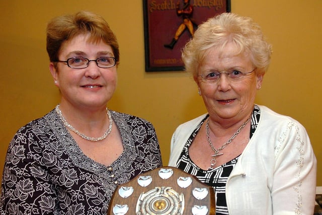 McKinney Shield winner Joan Carson pictured as she receives her award from Mrs Janet Porteus during Derryloran Bowling Club presentation dinner in 2010.