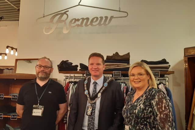 Chris Leech, Senior Pastor and Community Impact Co-ordinator with Emmanuel Church in Lurgan, Co Armagh with  Glenn Barr, Lord Mayor of Armagh, Banbridge and Craigavon Council and Nicola McIlwaine, Compassion Manager at Emmanuel Church at Renew, a clothes shop for those with limited funds.