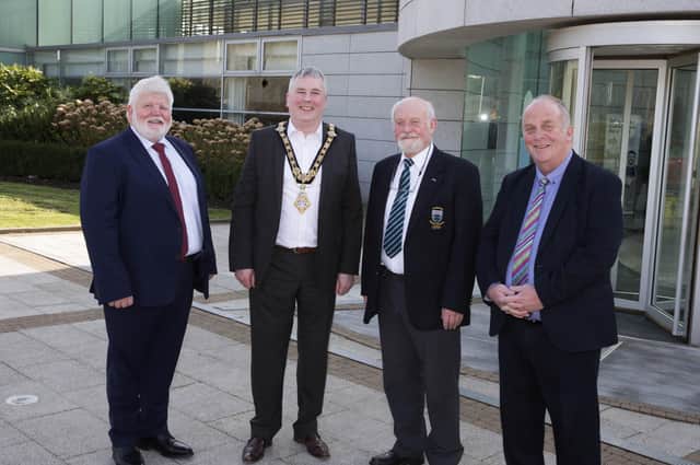 The Mayor of Causeway Coast and Glens Borough Council Councillor Richard Holmes pictured at Cloonavin with New Year Honours recipients, Sean McCarry, Dr Richard Briggs and Gordon Smyth