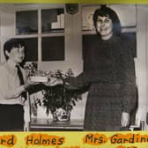 This picture from 1983 is on display in Garvagh Museum and shows Richard Holmes as a young pupil at Boveedy Primary School making a presentation to teacher Mrs Jennifer Gardiner to mark her retirement