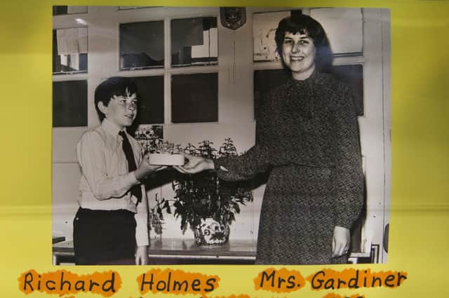 This picture from 1983 is on display in Garvagh Museum and shows Richard Holmes as a young pupil at Boveedy Primary School making a presentation to teacher Mrs Jennifer Gardiner to mark her retirement