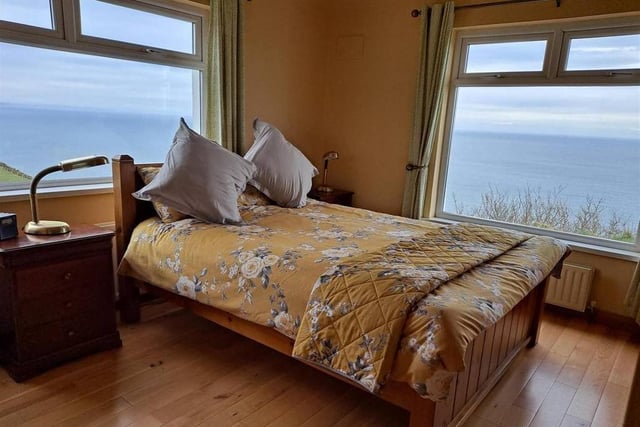 Master bedroom with dual aspect and splendid sea views.