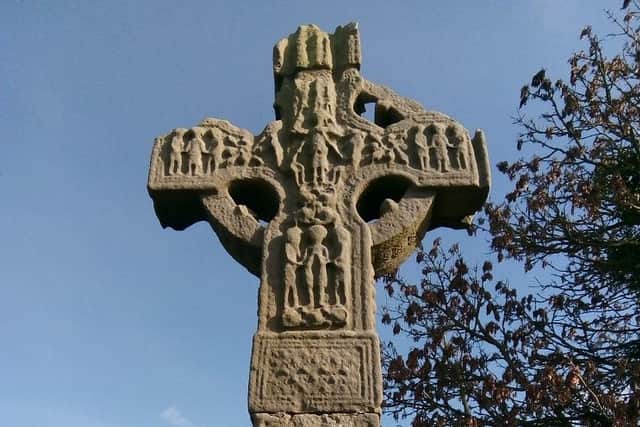 Ardboe Cross looks out across Lough Neagh.
