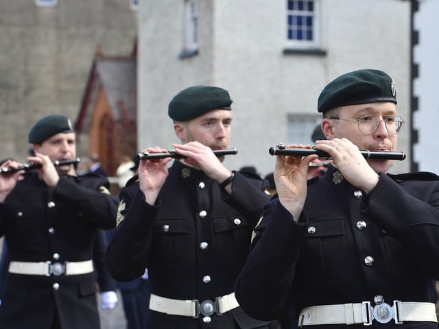 Keeping in tune during the parade.
Picture: Arthur Allison/Pacemaker Press.