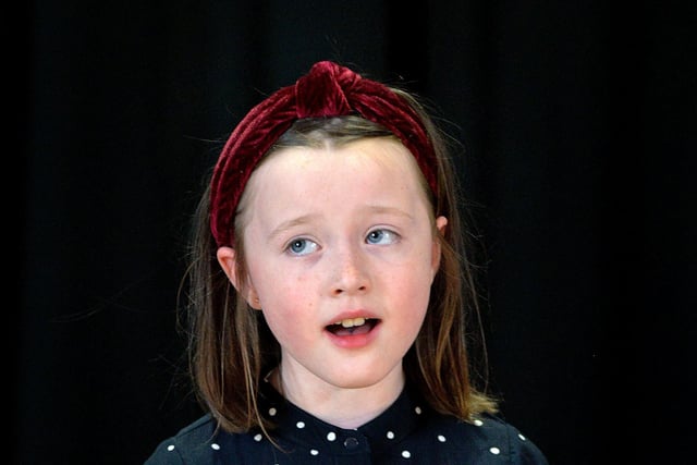 Erin McCool in action in the P5-7 Song From A Musical Show section of Portadown Music Festival. INPT13-218.