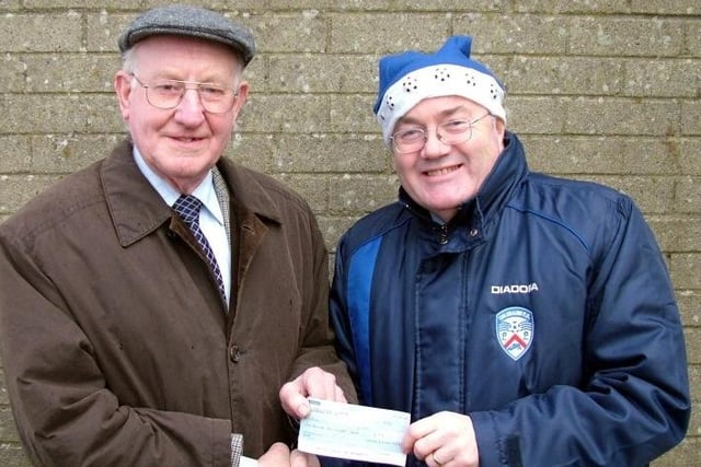 CHEQUE THIS...Garvagh, Kilrea and District Coleraine Supporters' Club Treasurer Sammy Stevenson presents a cheque to Coleraine Chief Executive, John Mairs.CR51-265s
