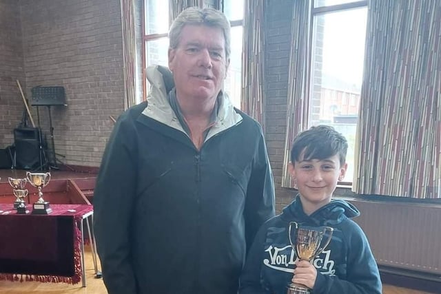Max Reid - Winner of the Elaine Hawthorne Memorial Cup for Junior Singer with the Most Potential. Pictured with Elaine's husband Ivan