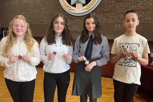 Kacey McGarel, Rebecca Robertson, Anna Montgomery, and Jareth Moores - who all won prizes in the Musical Theatre solo 13&14 years