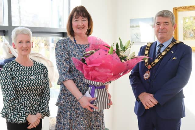 President Rosemary received flowers for her voluntary work from the ACC members