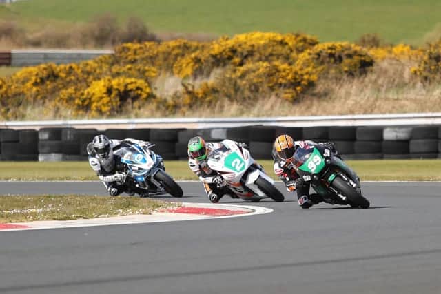 Jeremy McWilliams (IFS/Fonacab Paton) leads Cameron Dawson (JMcC Roofing Kawasaki) and Ryan Gibson (Gibson Motors Aprilia 660) in the Supertwin race. Picture: J Henry
