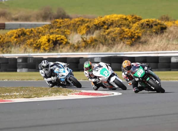 Jeremy McWilliams (IFS/Fonacab Paton) leads Cameron Dawson (JMcC Roofing Kawasaki) and Ryan Gibson (Gibson Motors Aprilia 660) in the Supertwin race. Picture: J Henry